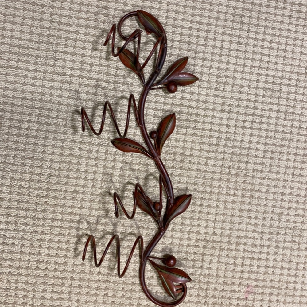 Wrought iron wine bottle wall holder/ wine rack